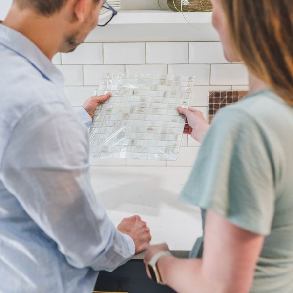 Couple looking at tile options