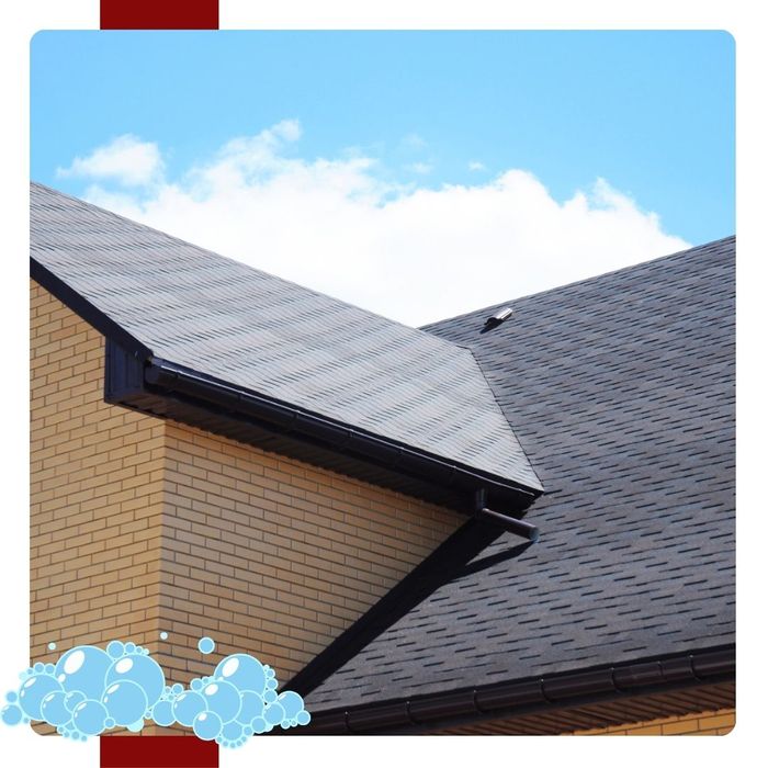 A clean, new-looking asphalt roof on top of a home