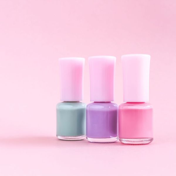 three pastel nail polishes