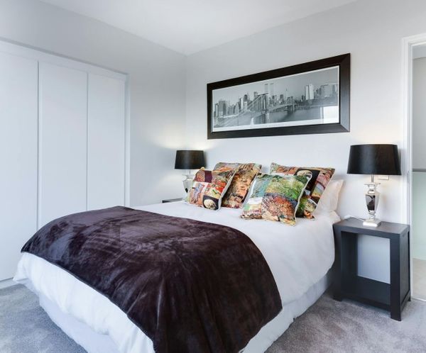 Modern bedroom with contemporary decor, possibly a finished basement bedroom