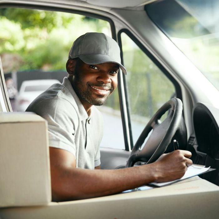 delivery driver smiling at camera