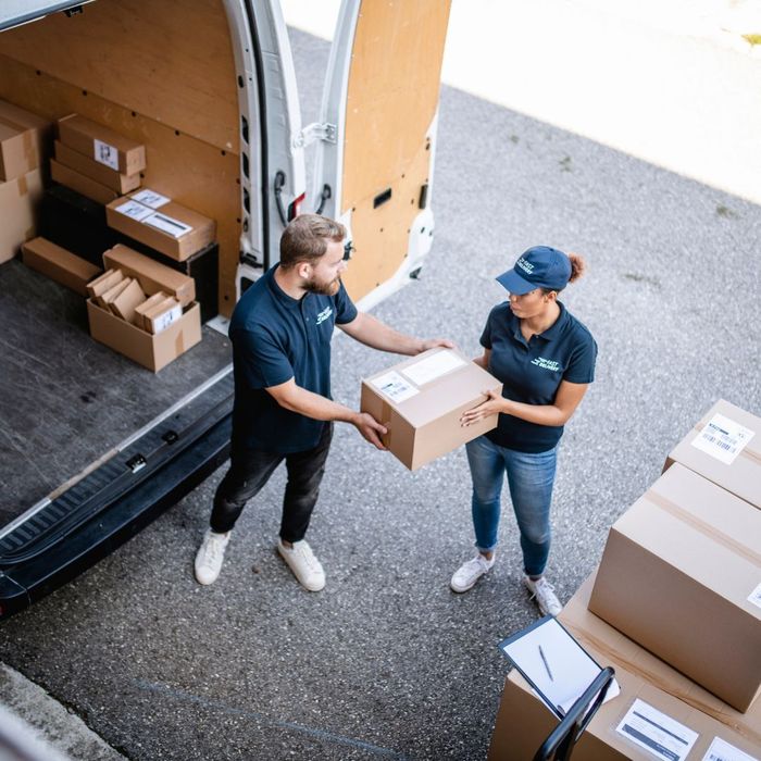 delivery driver loading packages