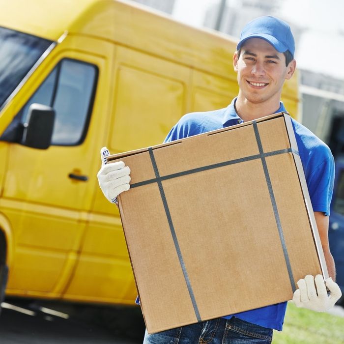 delivery driver carrying package