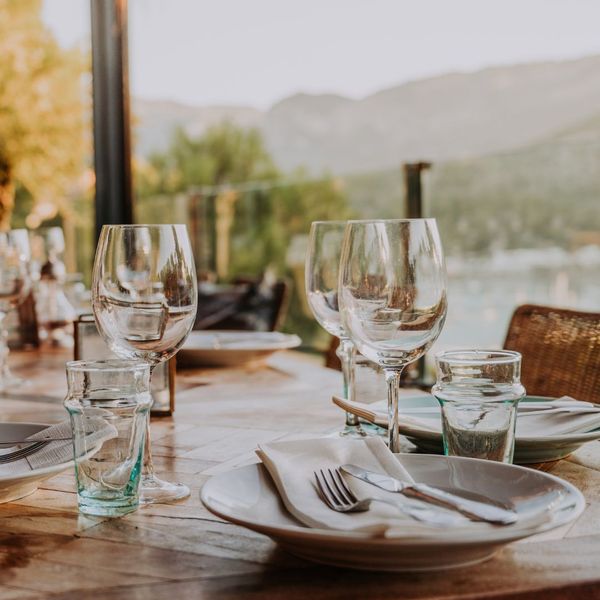 An elegant table setting with a mountain view 