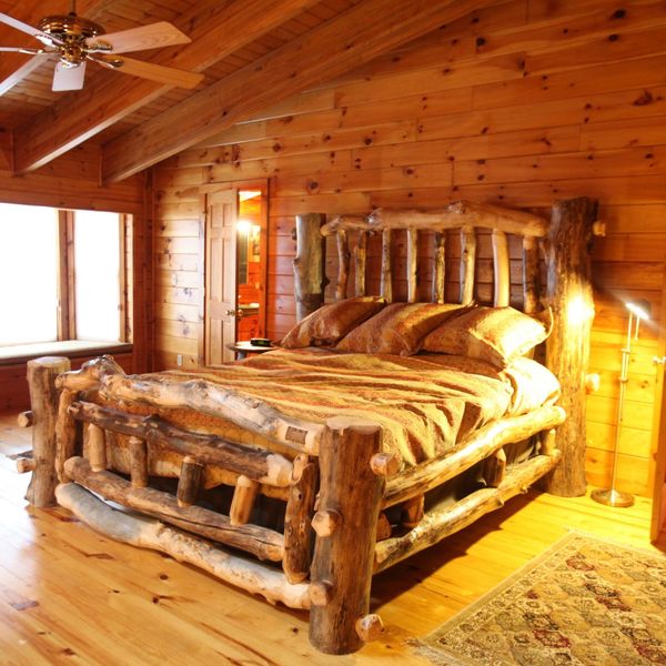 bed in log cabin