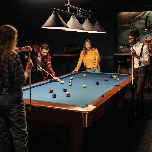 friends playing pool friends playing pool