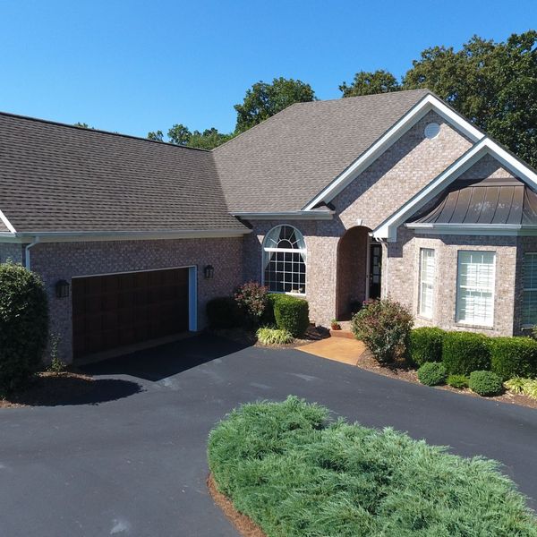 house with asphalt driveway