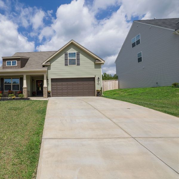 house with concrete driveway