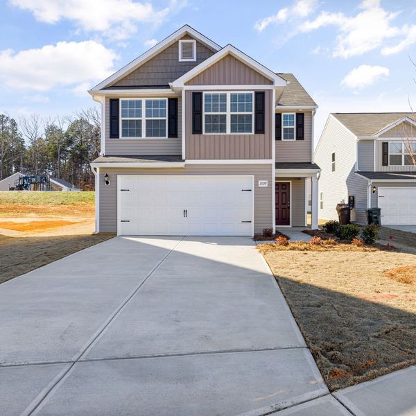 house with concrete driveway