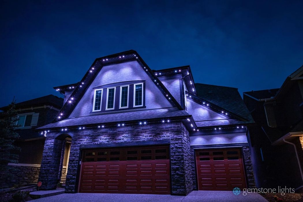 garage and roof of house with installed customizable LED lights