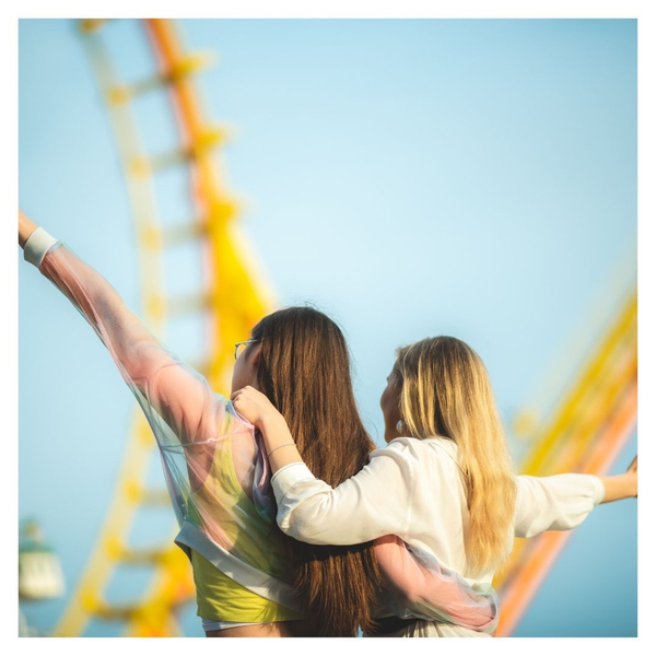 girls enjoying time at a theme park