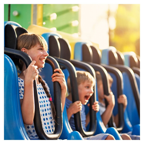 kids on a theme park ride