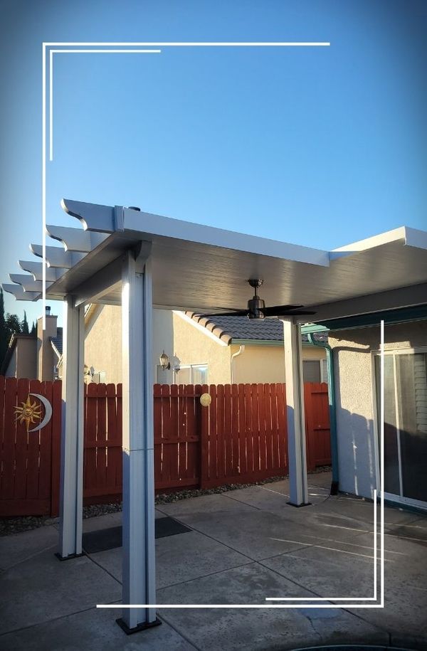 wood pergola outside on patio of home