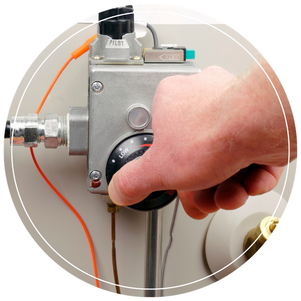 plumber adjusting control on water heater 