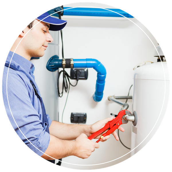 plumber servicing hot water heater 