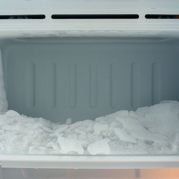 The interior of a freezer with frost buildup