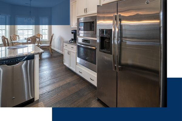 Kitchen with dishwasher, oven, microwave, and refrigerator Greeley4.png
