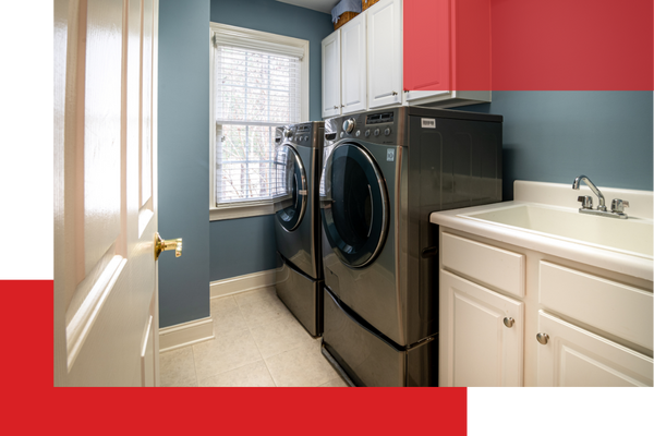 Laundry room with washer and dryer machines Wellington3.png