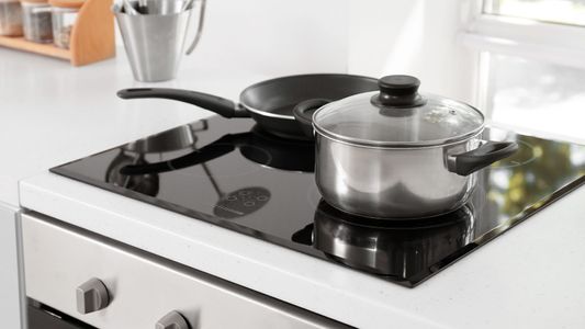 Electric stove top with a pot and pan