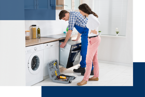 repairman fixing an appliance