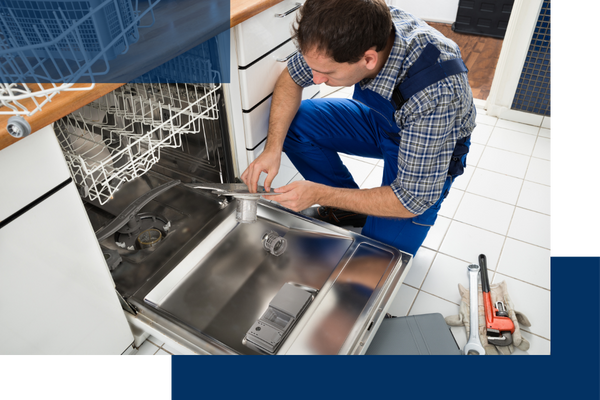 Technician repairing a dishwasher Greeley2.png