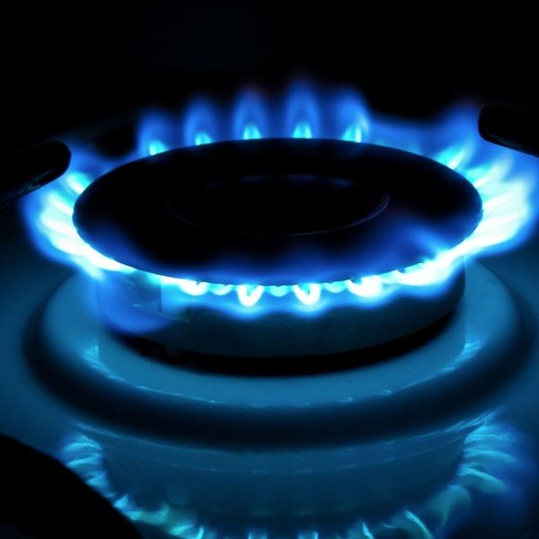 Blue flames of a gas stove range