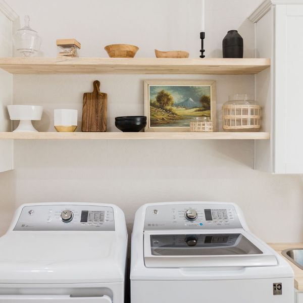 laundry room with shelves