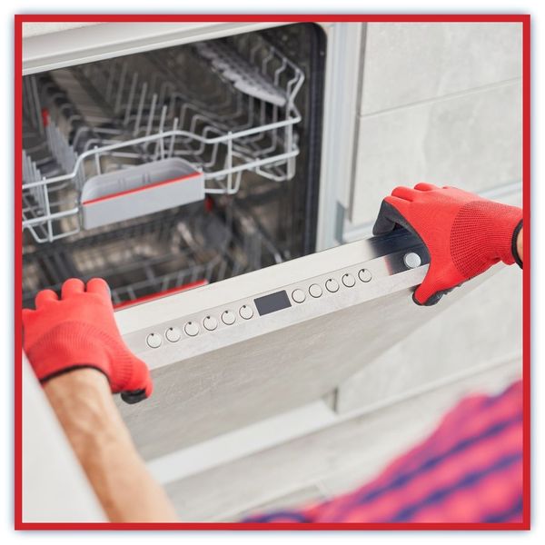 technician installing dishwasher