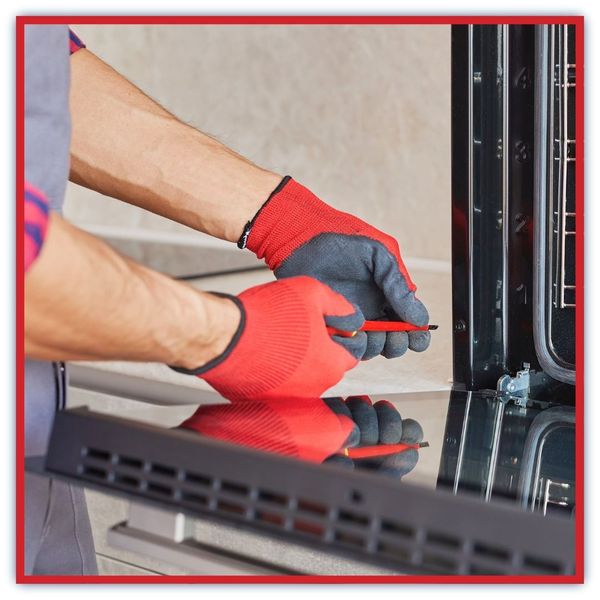 technician repairing oven