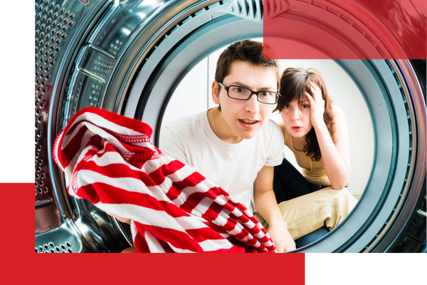 a couple looking distraught over their dryer Dacono.png