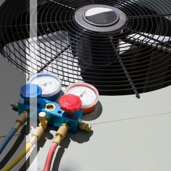 Testing meter resting on HVAC unit