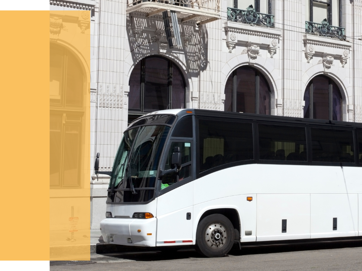 Image of charter bus outside of government building