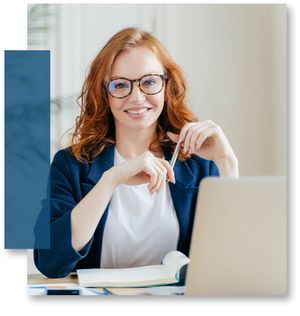 female worker with red hair and glasses