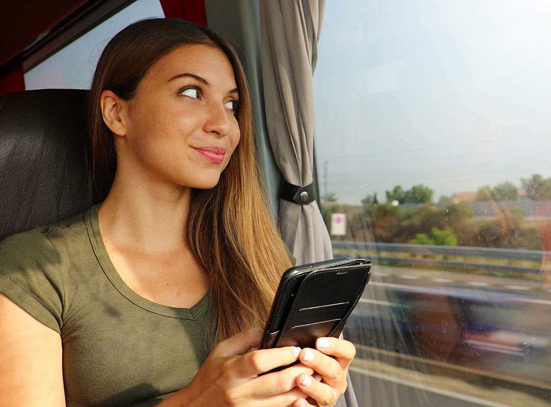 woman riding in coach