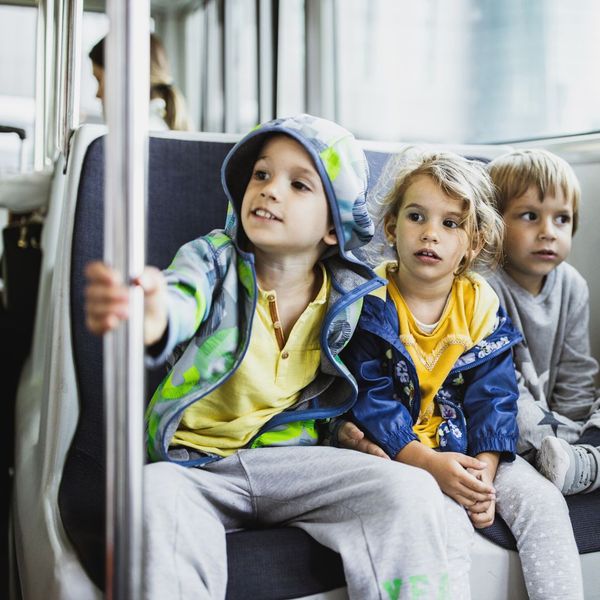 3 kids on a bus