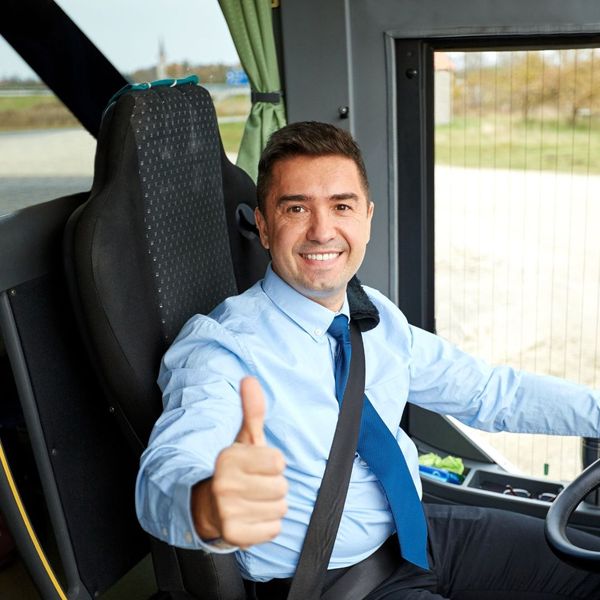 bus driver giving thumbs up