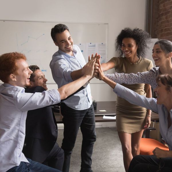 employees giving high fives