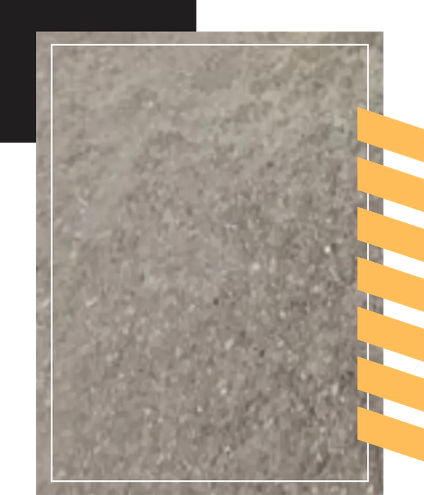 A flat, textured surface of a fine dirt and sand mixture.