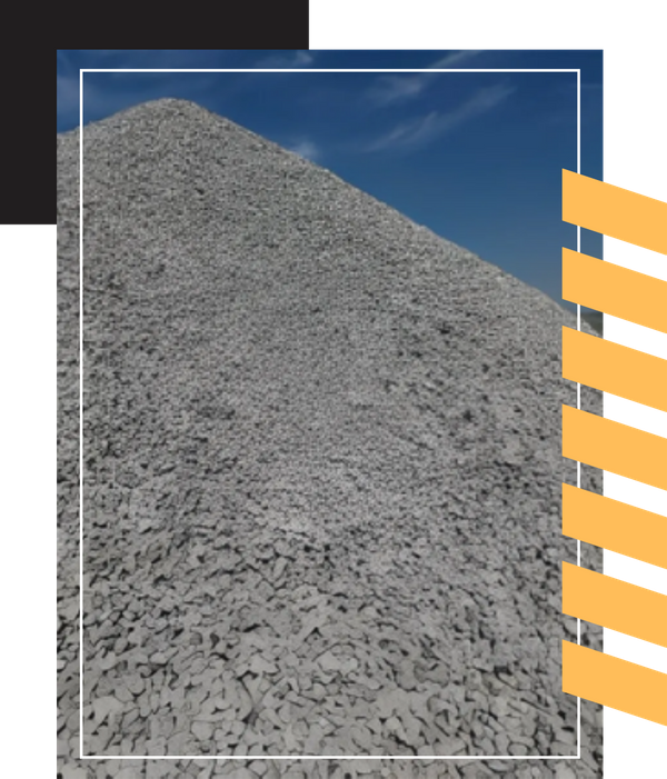 A steep pile of light gray crushed rocks and gravel.