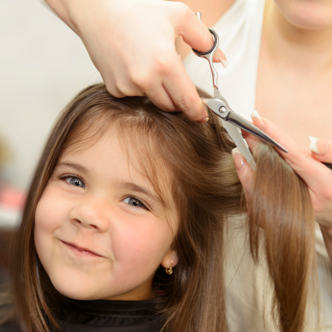 girl getting haircut