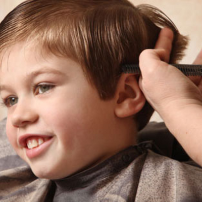 boy getting hair cut