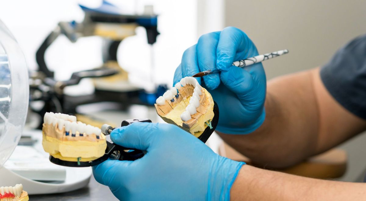 tech working in dental lab