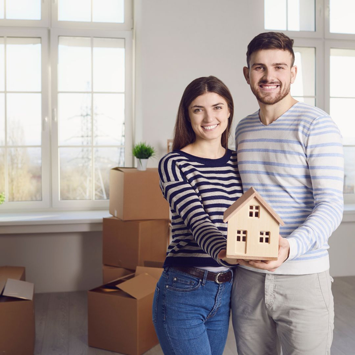 happy couple in new home