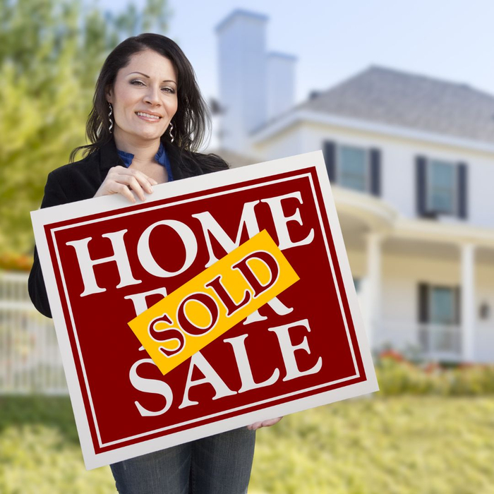 Home sold sign.