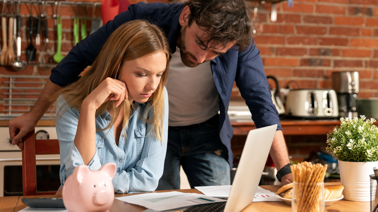 A couple looking at their budget.