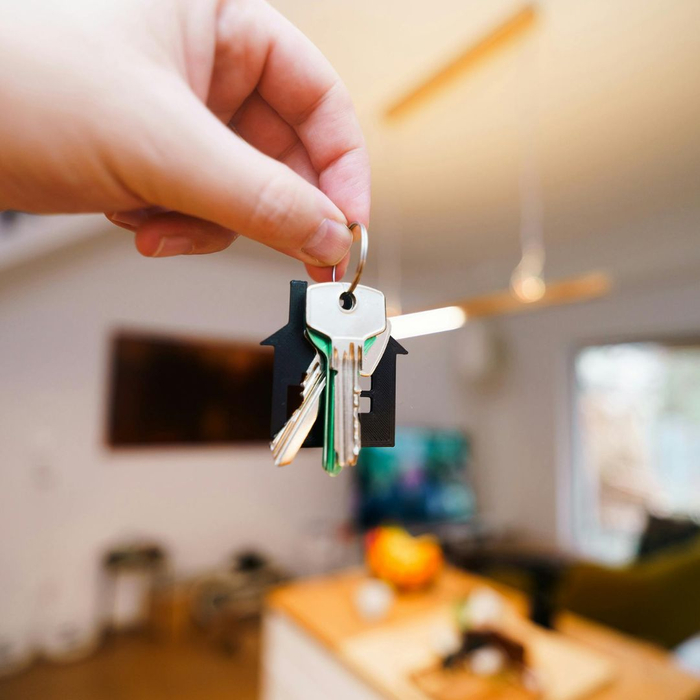 holding keys inside house
