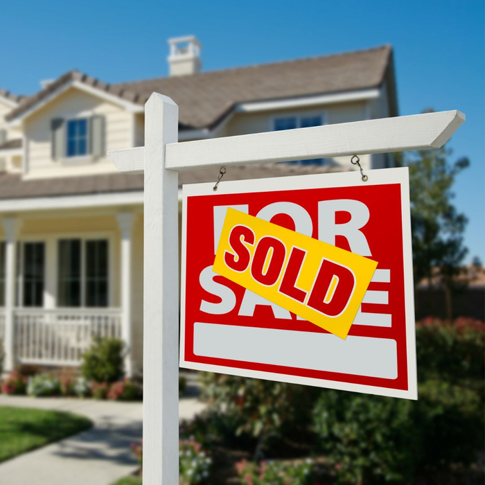 House sold sign.