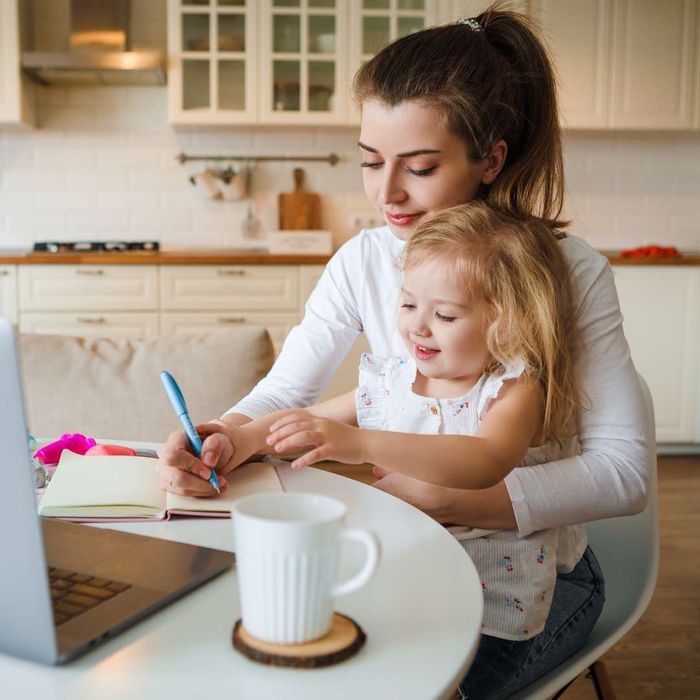 mother with daughter on lap