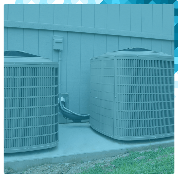 2 air conditioning units outside