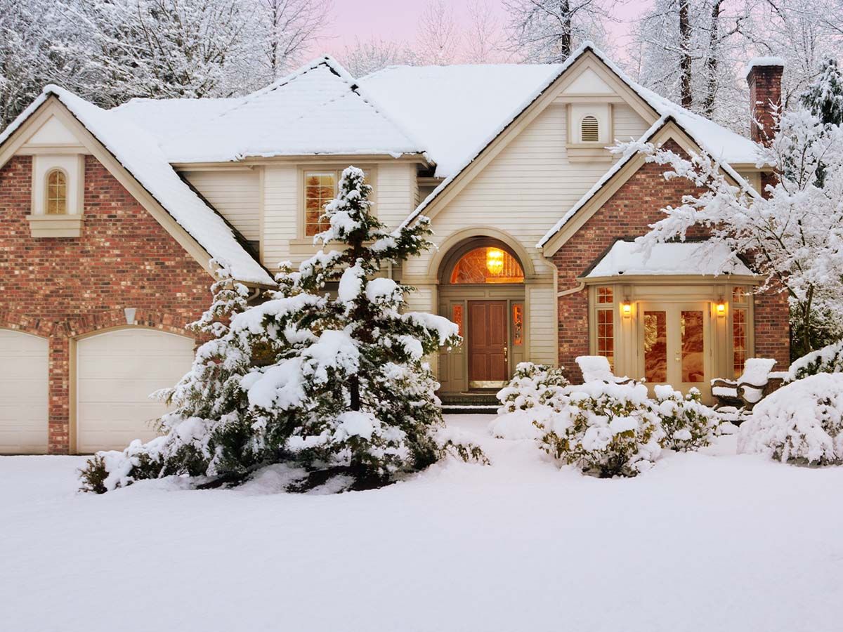 House in winter covered in snow